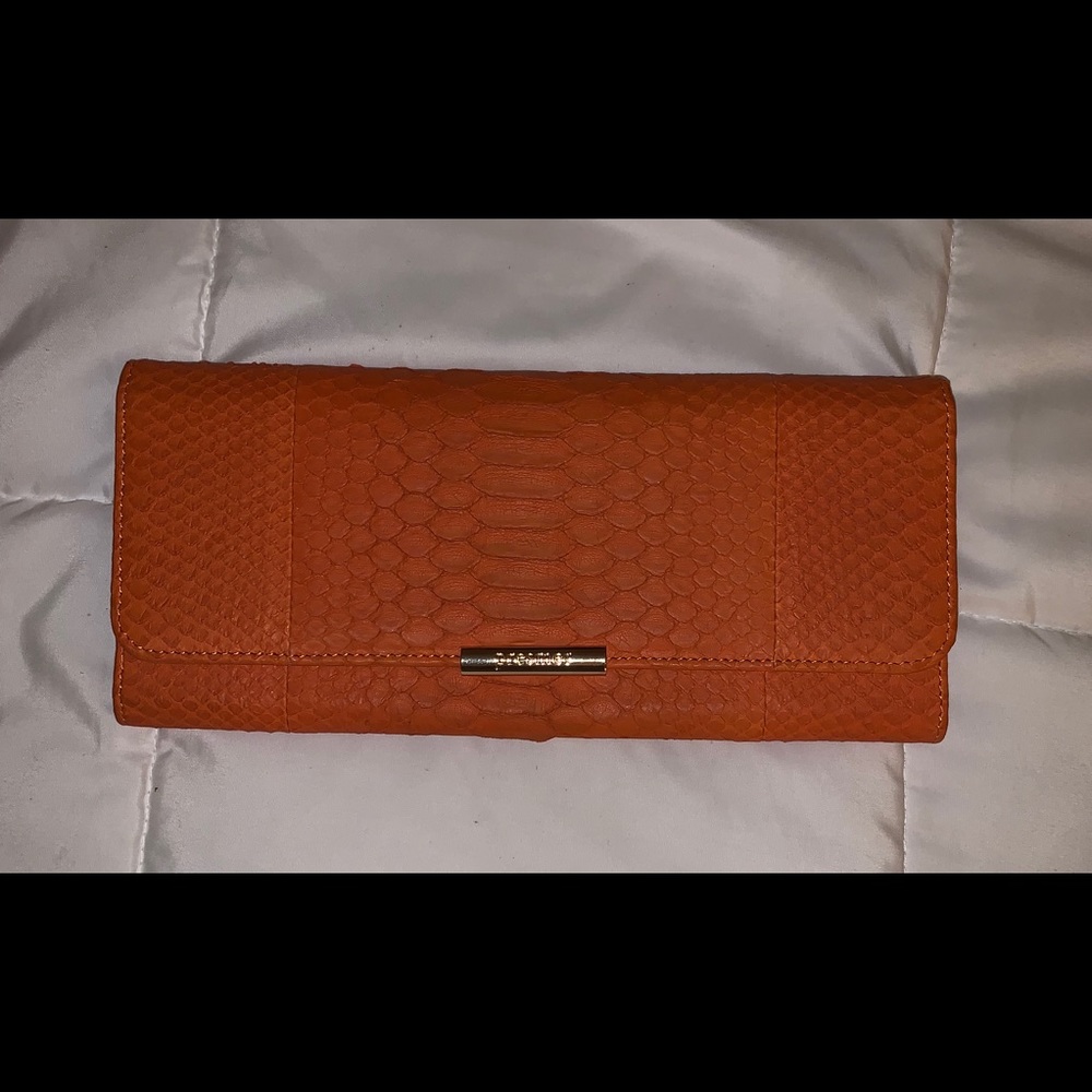 Snakeskin clutch bag